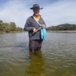 Rodney with his flat-head he caught at Lake Cathie