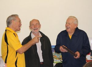 Iain, patron Brian Henderson and Tony share joke.