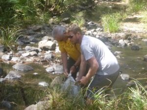 Visiting distant member Craig assisting the Editor releasing Fry at Doyles Creek
