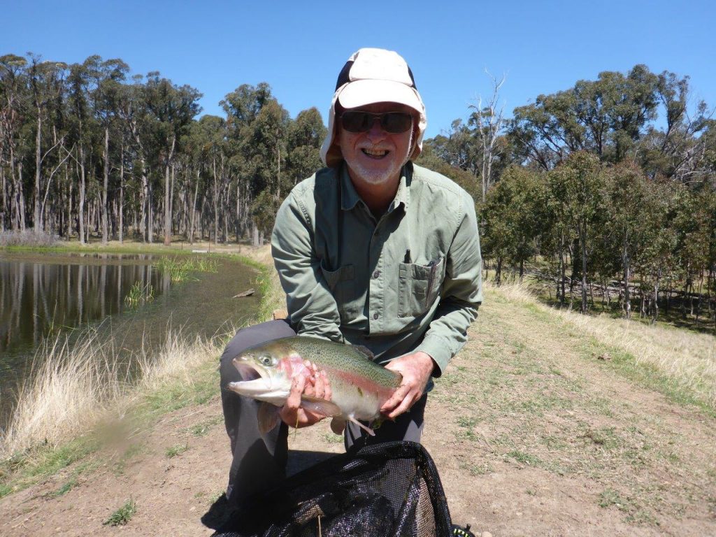 President David Spencer lands his 10lb trout, Dunmore Trout Waters