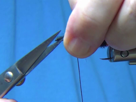 Step 6. Cut a small tip at the front of the zonker for an easy tie onto the hook.