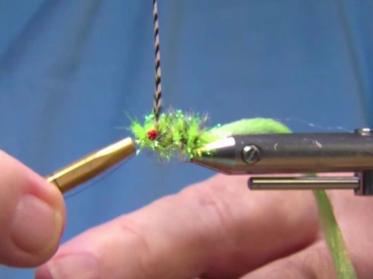 Tie off behind the eyes. Finish the fly off with a couple of double half hitches at the eye of the hook.