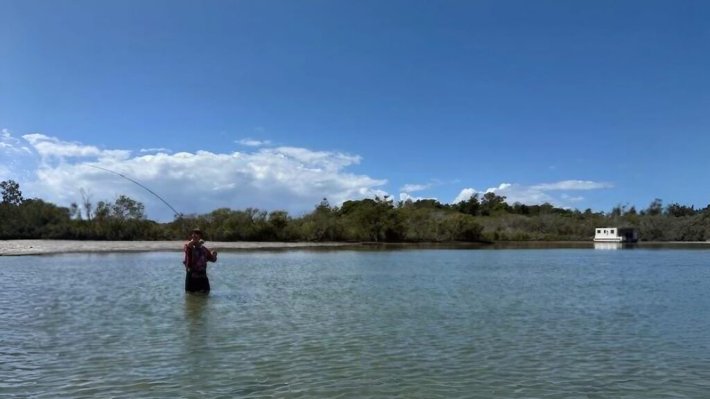 A lone fisher at North Haven sandflats