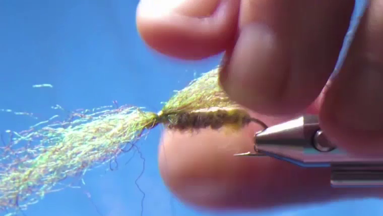 Green/brown Brazil Hair wing tied on, fibres splayed in both directions.
