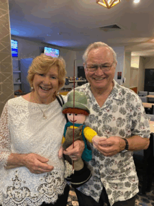 Bonnie and Iain Morrison with Club mascot Izzy.