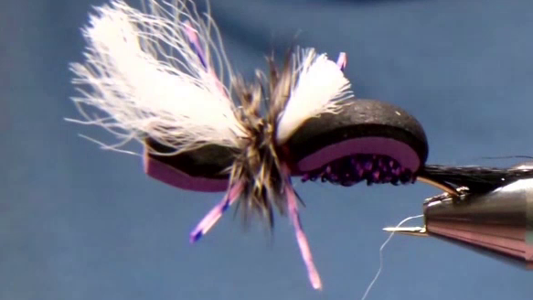 The finished Hippie Stomper Hopper: foam head trimmed neatly, poly wing shaped long in front and short in back, legs evened, and hackle trimmed flat on the underside for proper sit on the water.