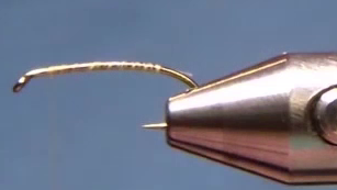 Barbless hook secured in the vise with thread wrapped smoothly along the shank from the eye to the bend and back again.