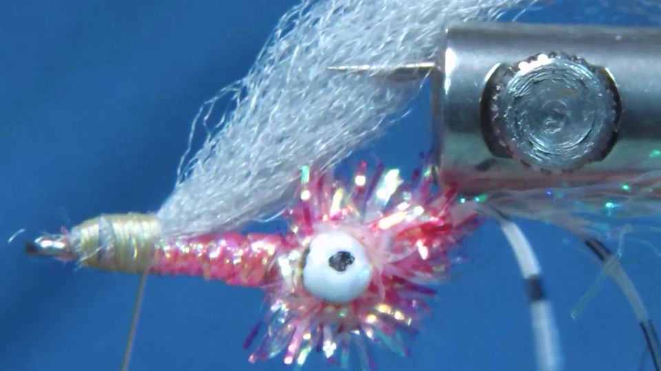 Diamond FF Braid wrapped forward to create the body, with a sparse wing of grey FTD Congo Plus tied in over the back of the fly.