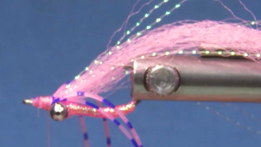 Three doubled strands of Crystal Flash added over the wing, creating subtle sparkle while maintaining a slim profile.