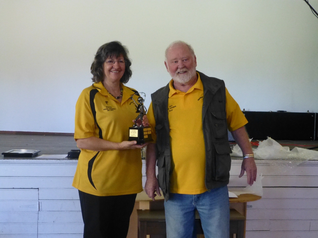 Secretary Bob presents Dawn with the new President Perpetual Trophy