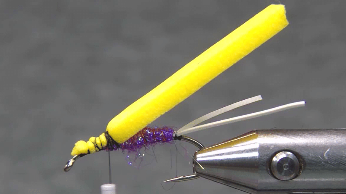 Yellow striped foam wing and orange foam strip tied in.