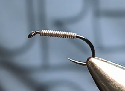 Charcoal Killer Bug hook with the shank evenly covered in wire