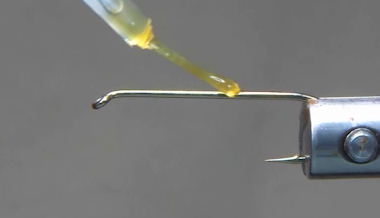 Hook barb crimped and hook shank prepared with Sally Hansen’s Hard as Nails.