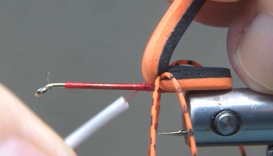 First foam segment secured with thread and two rubber legs tied in.