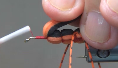 Second foam segment tied in, with the segmented orange body taking shape.