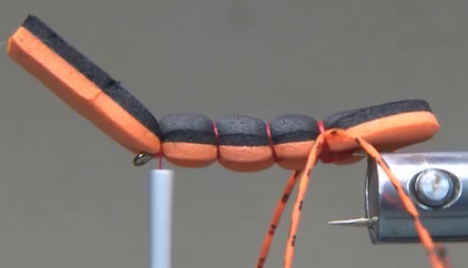 Additional foam segments secured along the hook shank to form the body.